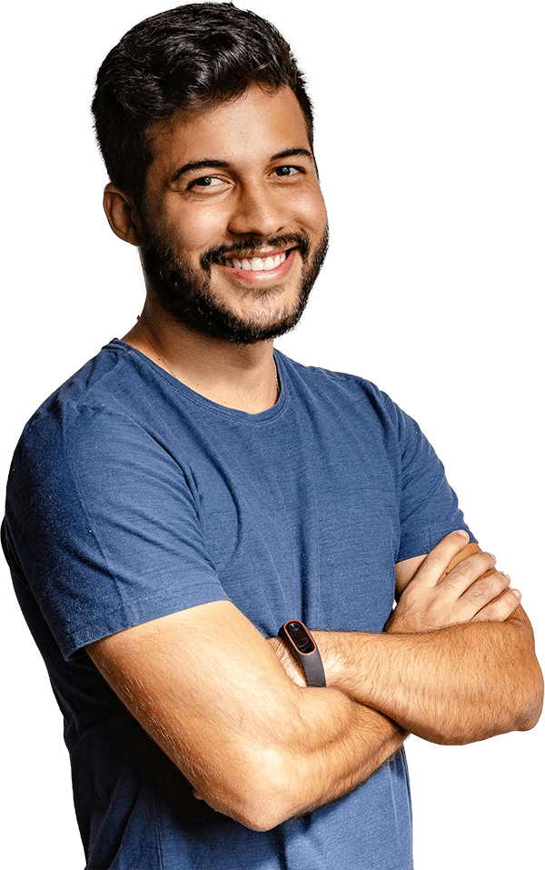 a young man smiling at the camera