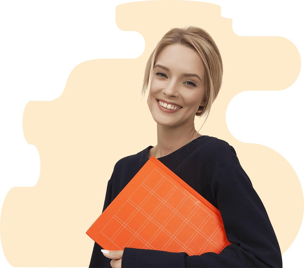 a woman with a book looking at the camera